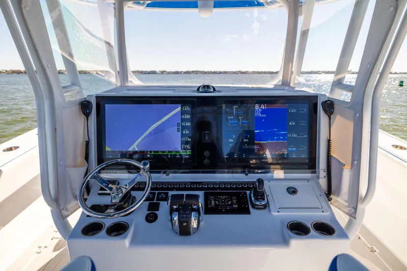  Yacht Photos Pics Freeman 42 LR 2022 boat dashboard with advanced navigation screens and controls.