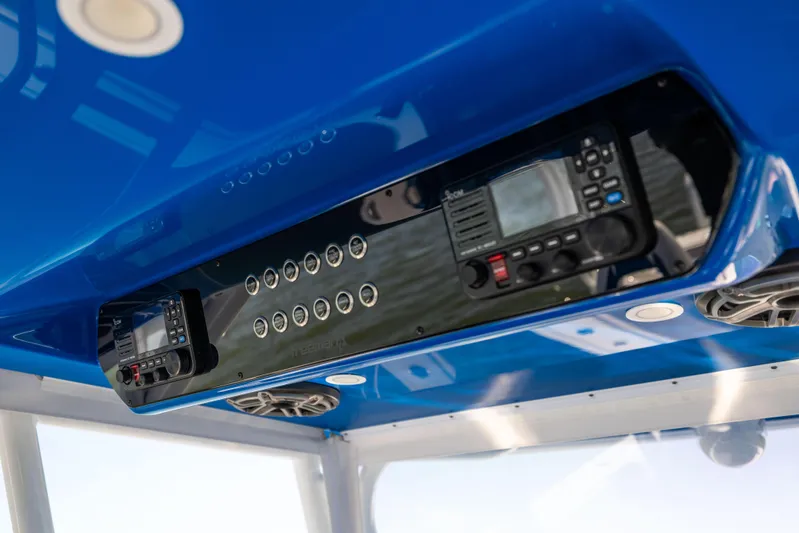  Yacht Photos Pics Freeman 42 LR 2022 boat dashboard with control panel and radio equipment.