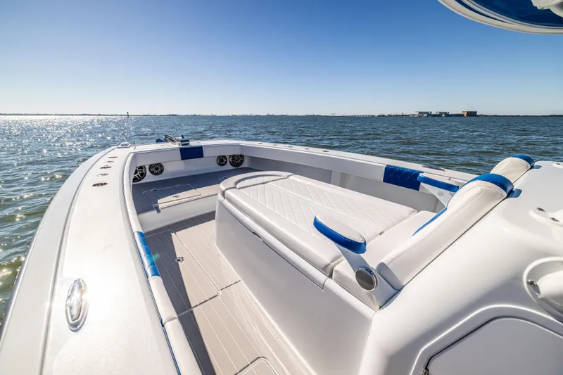  Yacht Photos Pics 2022 Freeman 42 LR boat on open water, featuring sleek seating and modern design.