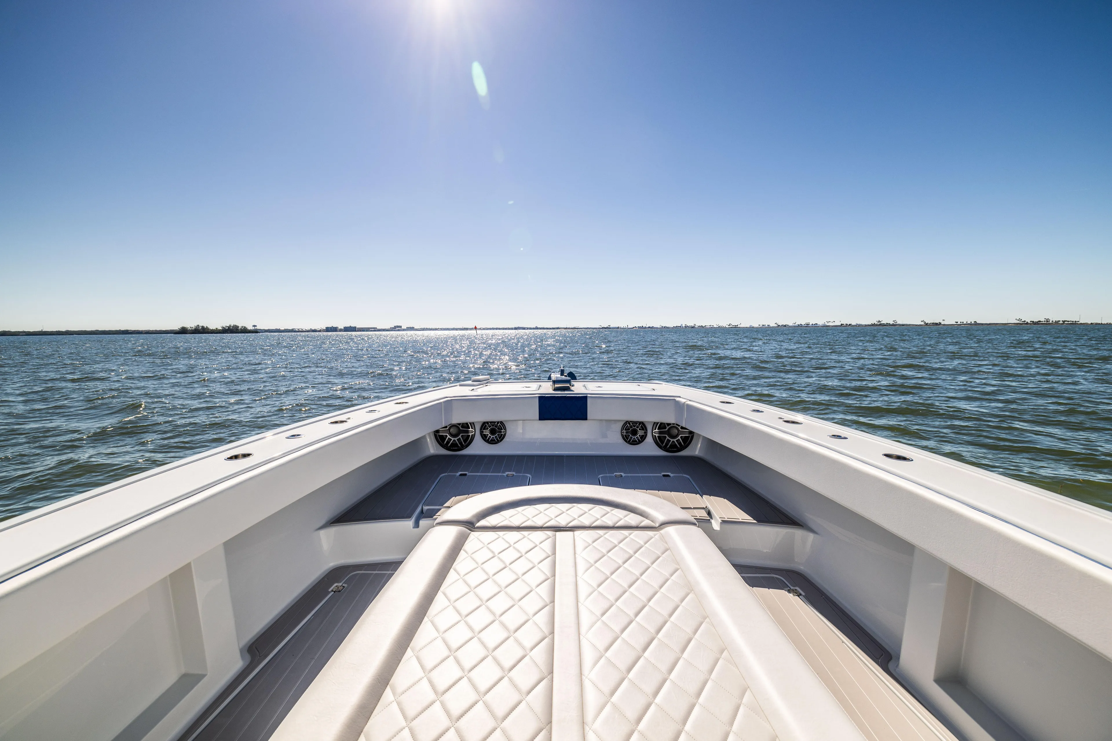  Yacht Photos Pics Freeman 42 LR 2022 boat on open water under clear blue sky.