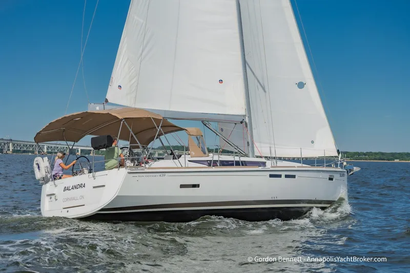 Balandra Yacht Photos Pics 2014 Jeanneau Sun Odyssey 439 sailing on open water under clear blue skies.