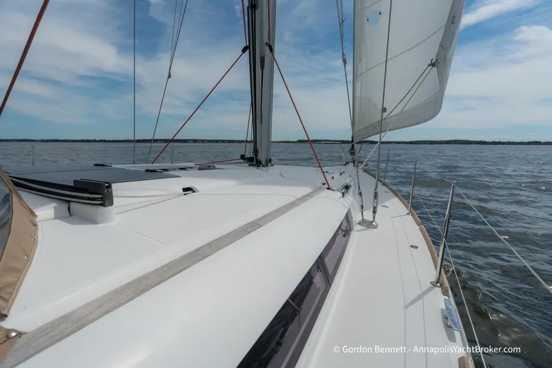 Balandra Yacht Photos Pics 2014 Jeanneau Sun Odyssey 439 sailing on open water under clear skies.