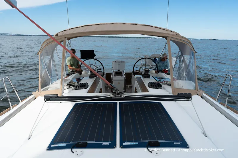 Balandra Yacht Photos Pics 2014 Jeanneau Sun Odyssey 439 sailing on open water, featuring dual helm and solar panels.