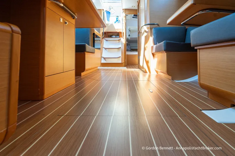 Balandra Yacht Photos Pics Interior of 2014 Jeanneau Sun Odyssey 439 yacht, featuring sleek wood flooring and modern design.