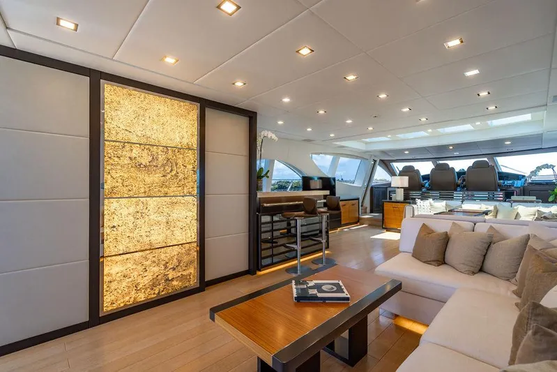 Mixed Emotions Yacht Photos Pics Luxurious interior of 2014 Mangusta 110 yacht with modern decor and elegant lighting.