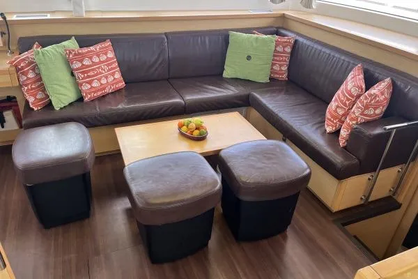 Searching For Bliss Yacht Photos Pics Luxurious Lagoon 450 F 2011 yacht interior with leather seating and decorative pillows.