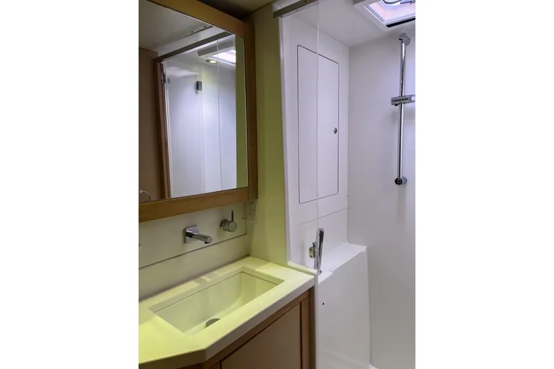 Searching For Bliss Yacht Photos Pics Bathroom interior of 2011 Lagoon 450 F yacht with modern fixtures and shower.