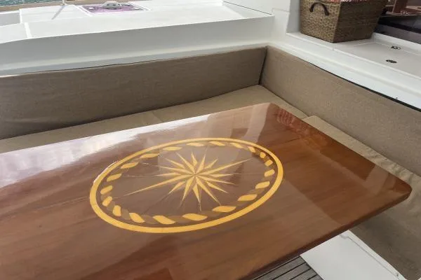 Searching For Bliss Yacht Photos Pics Luxurious Lagoon 450 F 2011 yacht interior with elegant wooden table design.