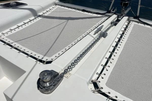 Searching For Bliss Yacht Photos Pics Catamaran deck of 2011 Lagoon 450 F with netting and winch.