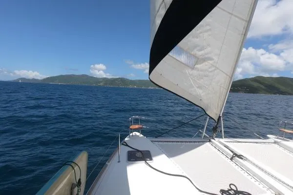 Searching For Bliss Yacht Photos Pics Sailing on a 2011 Lagoon 450 F catamaran with scenic ocean and island views.