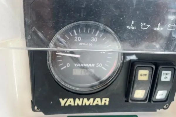 Searching For Bliss Yacht Photos Pics Yanmar engine control panel on 2011 Lagoon 450 F, showing RPM gauge and control buttons.