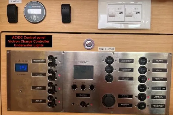 Searching For Bliss Yacht Photos Pics Control panel of a 2011 Lagoon 450 F yacht with various switches and indicators.