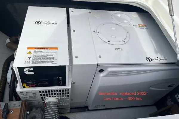 Searching For Bliss Yacht Photos Pics Engine compartment of 2011 Lagoon 450 F with generator replaced in 2022, low hours.