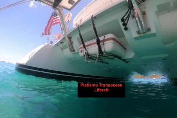 Searching For Bliss Yacht Photos Pics Underwater view of 2011 Lagoon 450 F catamaran with Platismo Transocean liferaft.