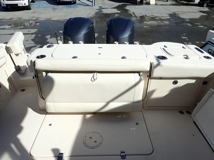  Yacht Photos Pics 2019 Grady-White Freedom 325 boat deck with dual engines and seating area.