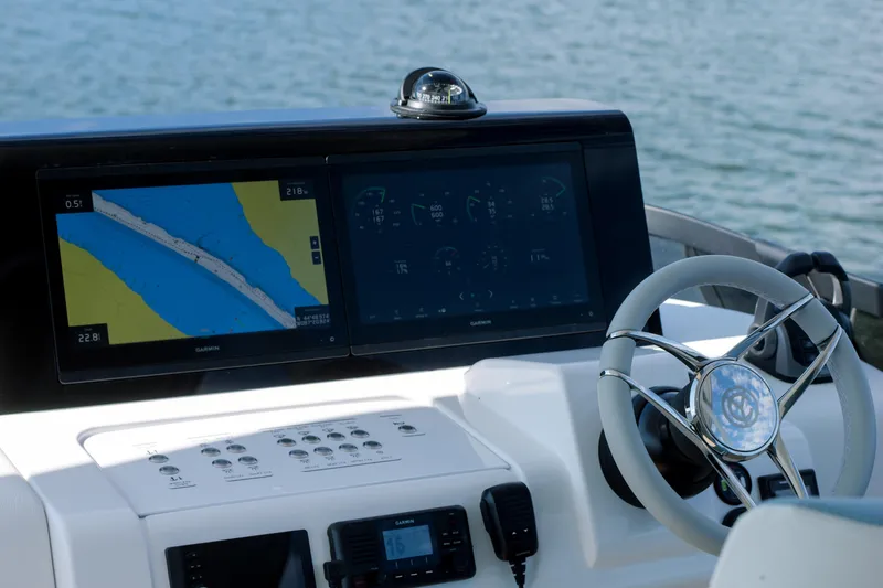  Yacht Photos Pics Helm of 2026 Cruisers Yachts 57 Fly with advanced navigation displays.