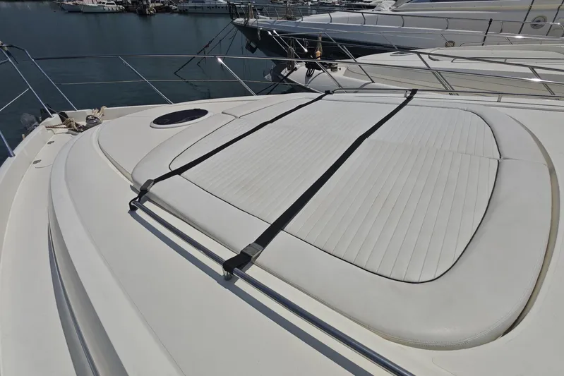  Yacht Photos Pics Sunseeker Manhattan 74 yacht deck, 2001 model, featuring sleek design and sunbathing area.