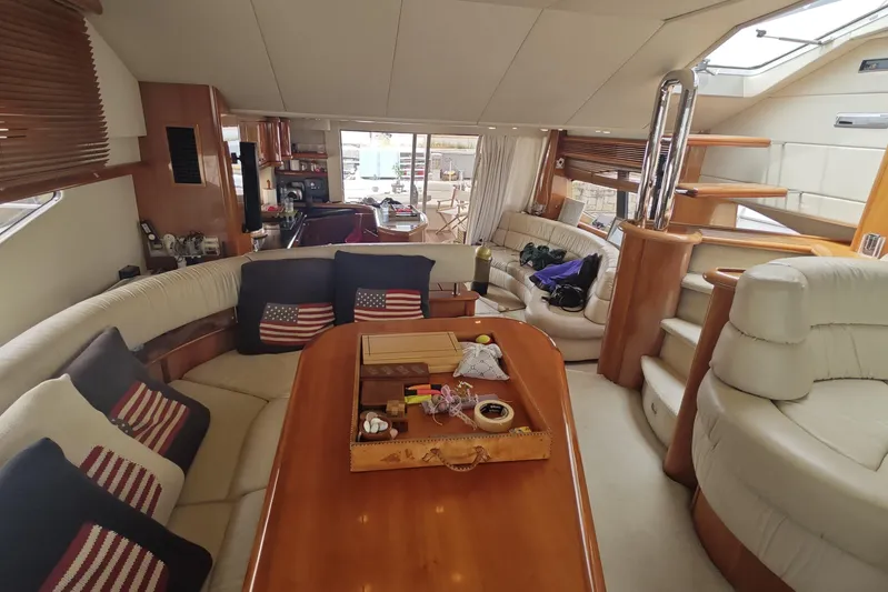  Yacht Photos Pics Luxurious interior of 2001 Sunseeker Manhattan 74 yacht with elegant seating and decor.