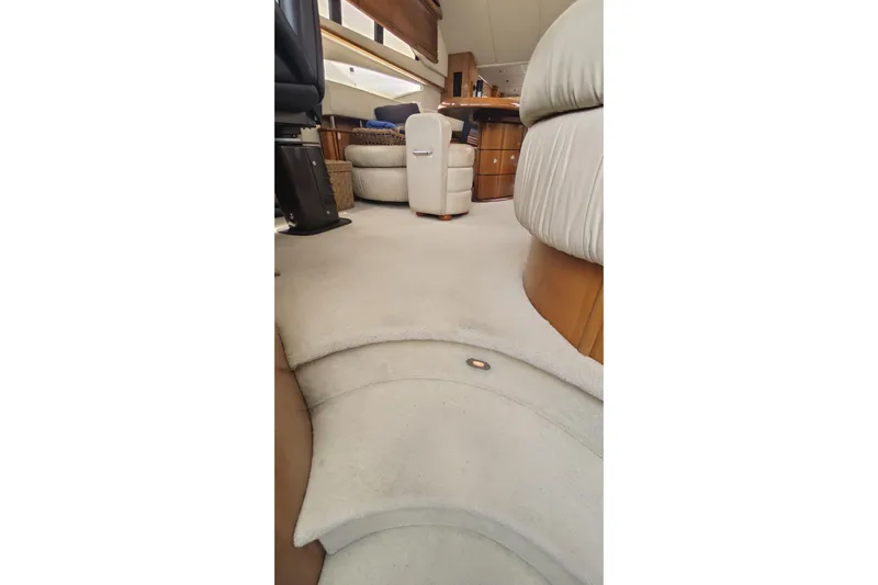  Yacht Photos Pics Interior of 2001 Sunseeker Manhattan 74 yacht, featuring plush seating and elegant design.