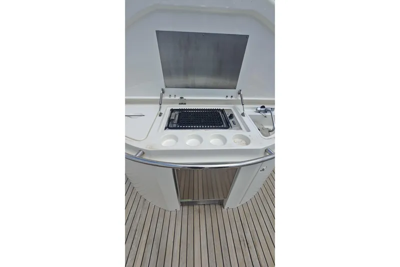 Yacht Photos Pics Outdoor grill station on 2001 Sunseeker Manhattan 74 yacht deck.