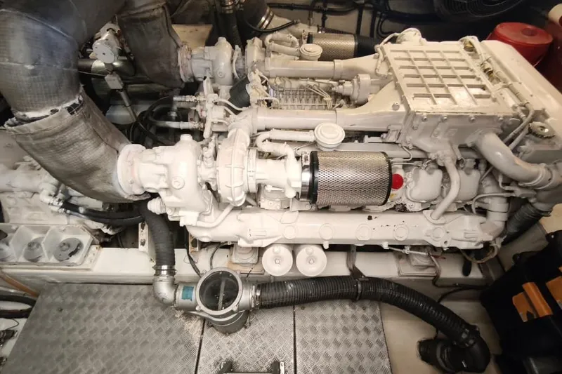  Yacht Photos Pics Engine room of 2001 Sunseeker Manhattan 74 yacht, showcasing detailed machinery components.