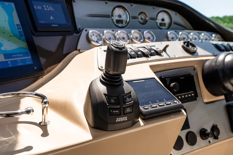 Four Fans Yacht Photos Pics Control panel of 2008 Four Winns V378 boat with joystick and navigation screens.