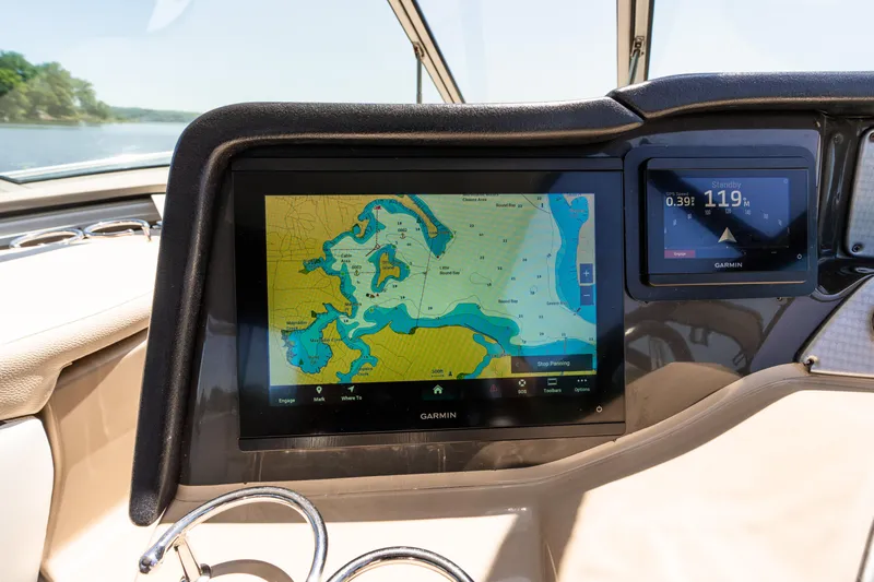 Four Fans Yacht Photos Pics 2008 Four Winns V378 boat dashboard with navigation screen displaying a nautical map.