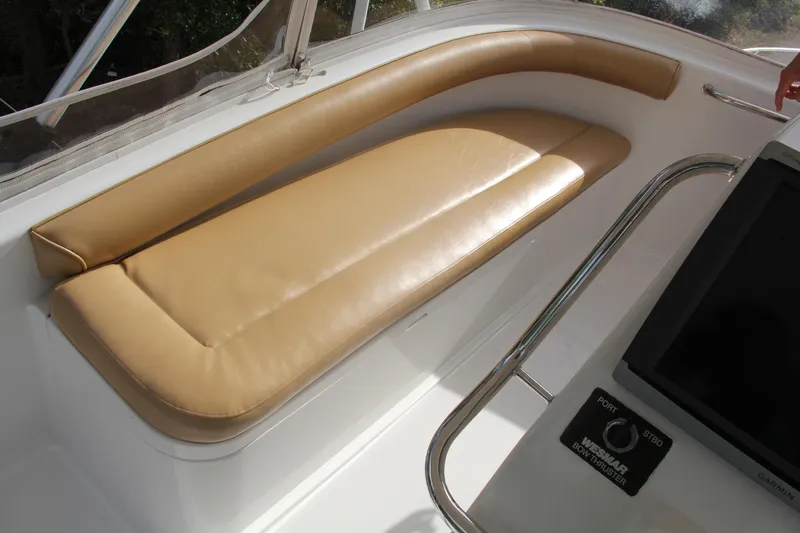  Yacht Photos Pics 2005 Cabo Flybridge CAT C18 boat interior with tan leather seating.