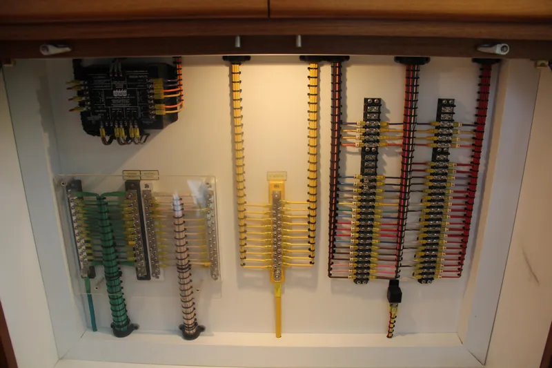  Yacht Photos Pics Electrical panel of 2005 Cabo Flybridge CAT C18 with organized wiring and connectors.