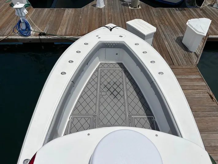 Albie Fishing Yacht Photos Pics 2007 SeaVee 34B boat docked, showcasing spacious bow and sleek design.