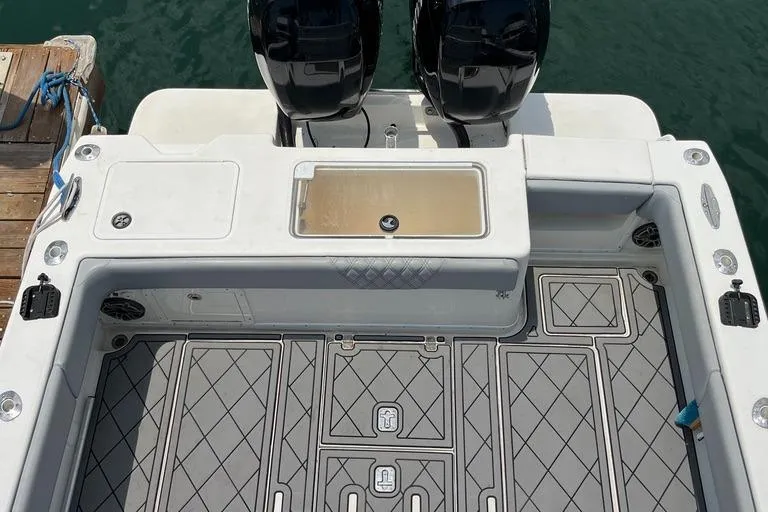 Albie Fishing Yacht Photos Pics 2007 SeaVee 34B boat deck with dual engines and non-slip flooring.