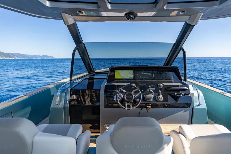  Yacht Photos Pics 2026 Pardo Yachts P43 helm with ocean view, featuring modern controls and luxurious seating.