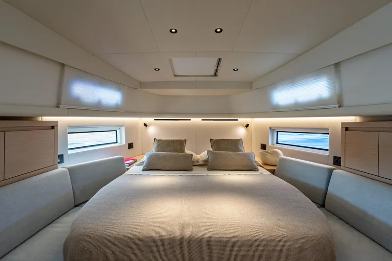  Yacht Photos Pics Luxurious interior cabin of 2026 Pardo Yachts P43, featuring elegant bedding and modern design.
