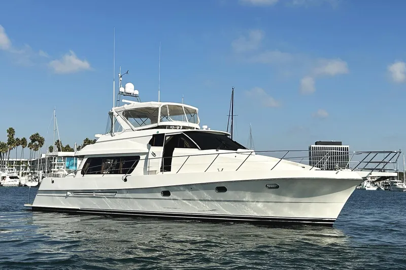 Times Like These Yacht Photos Pics 2004 McKinna 57 PHMY Widebody yacht with stabilization on calm water.