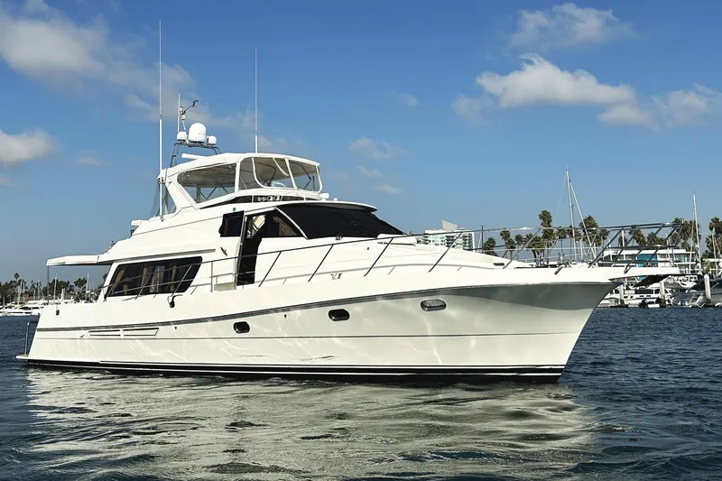 Times Like These Yacht Photos Pics 2004 McKinna 57 PHMY Widebody yacht with stabilization on calm waters.
