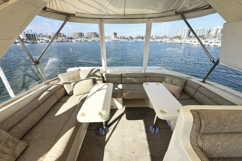 Times Like These Yacht Photos Pics Luxurious interior of 2004 McKinna 57 PHMY yacht with waterfront view.