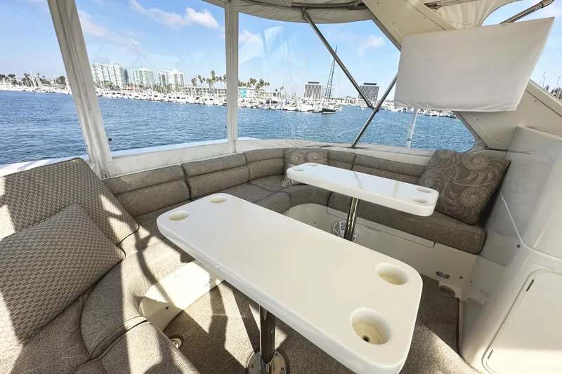 Times Like These Yacht Photos Pics Luxurious seating area on 2004 McKinna 57 PHMY yacht with ocean view.