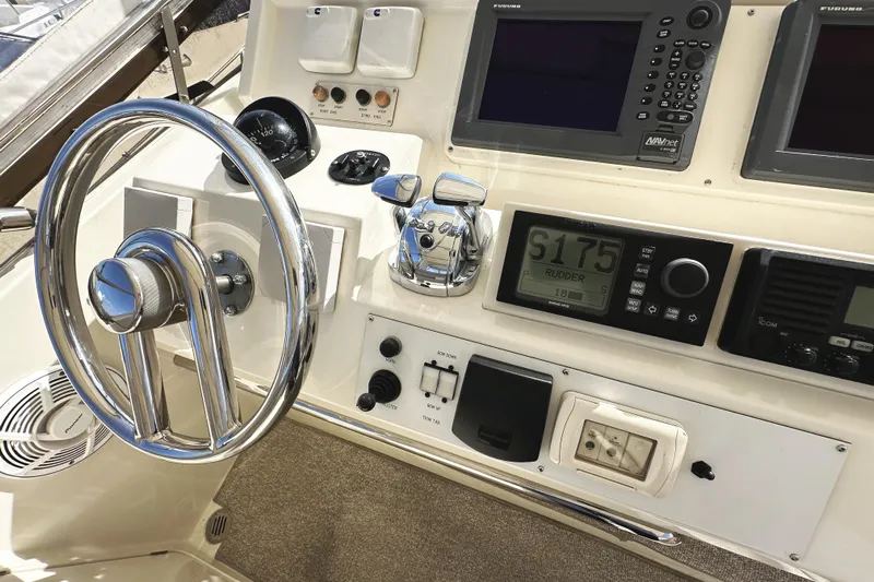 Times Like These Yacht Photos Pics Control panel of a 2004 McKinna 57 PHMY Widebody yacht with stabilization features.