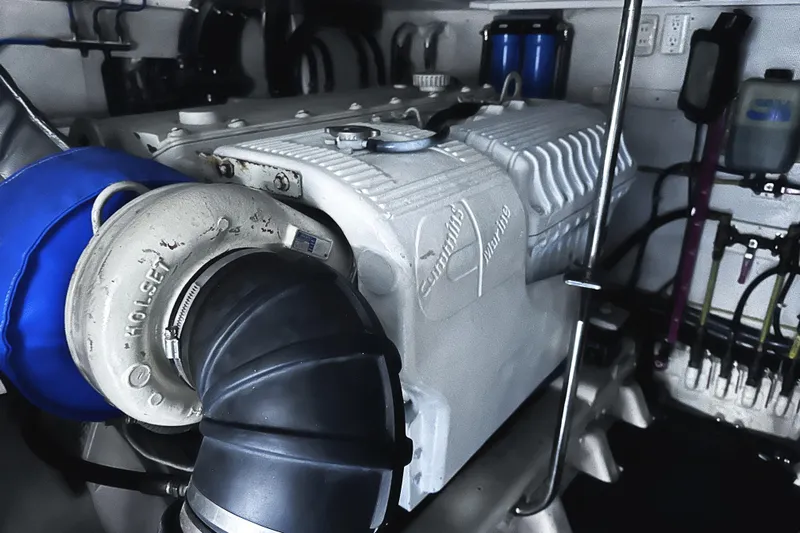 Times Like These Yacht Photos Pics Engine room of 2004 McKinna 57 PHMY Widebody yacht with Cummins marine engine.
