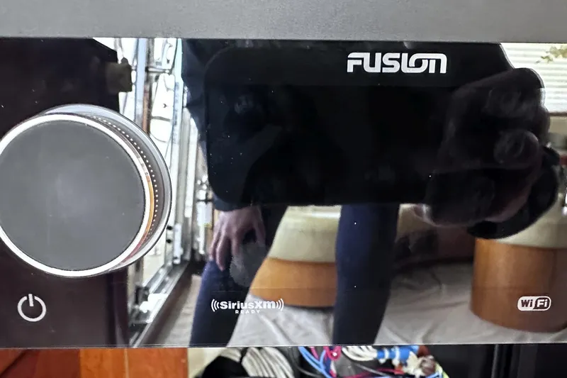 Times Like These Yacht Photos Pics Fusion audio system on a 2004 McKinna 57 PHMY yacht, featuring SiriusXM and WiFi capabilities.