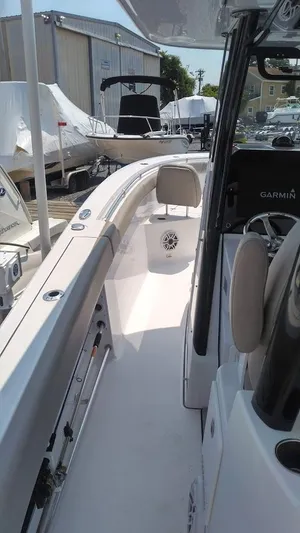  Yacht Photos Pics 2022 Sportsman Open 302 Center Console boat interior, docked at a marina.