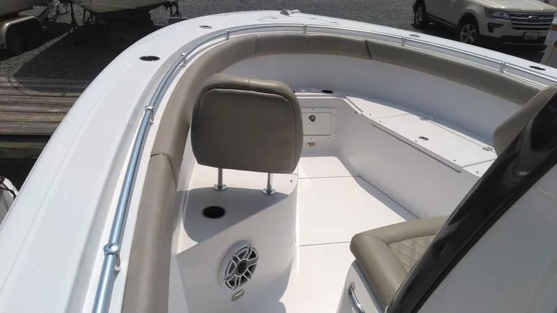  Yacht Photos Pics 2022 Sportsman Open 302 Center Console boat interior with seating and speaker.
