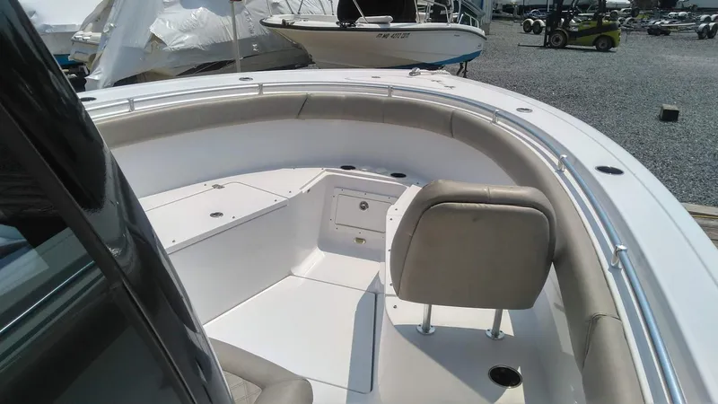  Yacht Photos Pics 2022 Sportsman Open 302 Center Console boat interior with seating and storage compartments.