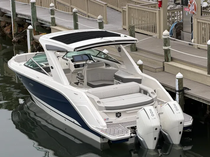  Yacht Photos Pics 2024 Sea Ray SLX 310 Outboard at dock, luxurious design.