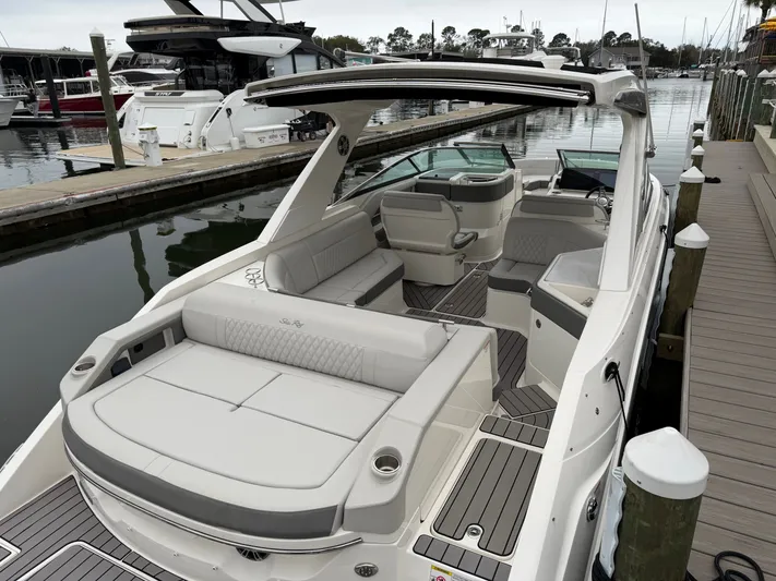  Yacht Photos Pics 2024 Sea Ray SLX 310 Outboard at dock, luxurious design.