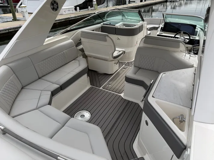  Yacht Photos Pics Interior of 2024 Sea Ray SLX 310 Outboard with luxurious seating.