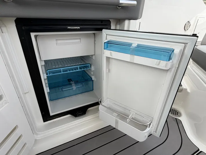  Yacht Photos Pics Open refrigerator in Sea Ray SLX 310 Outboard 2024 boat.
