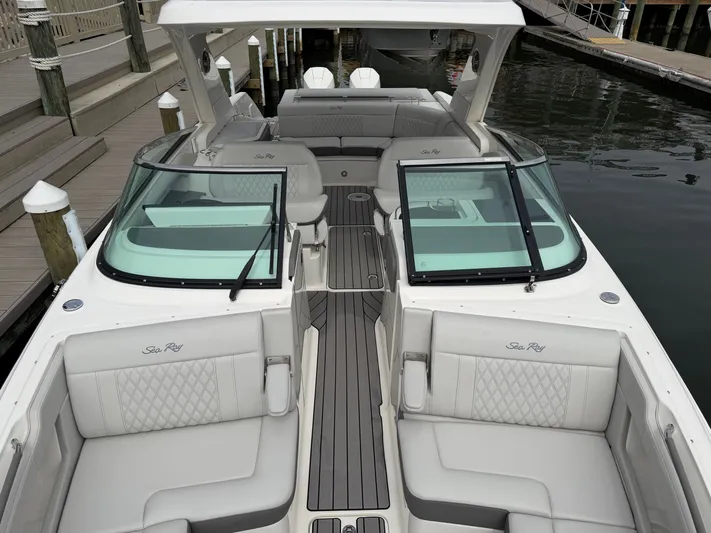  Yacht Photos Pics 2024 Sea Ray SLX 310 Outboard, luxury boat docked.