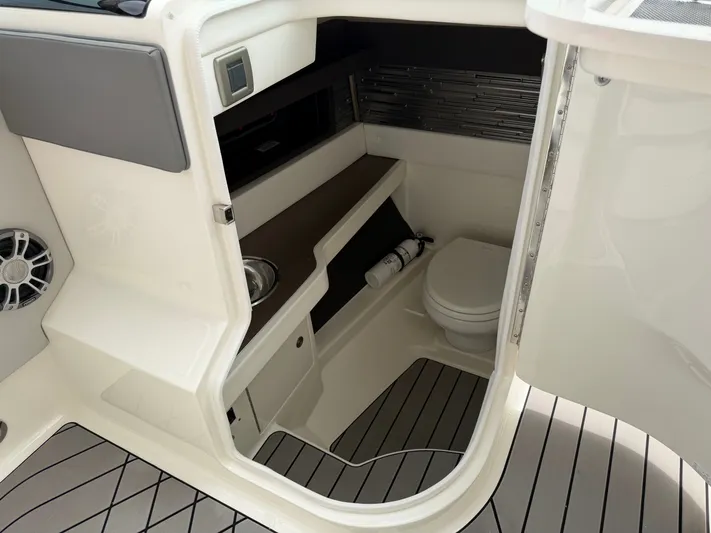  Yacht Photos Pics Interior of 2024 Sea Ray SLX 310 Outboard with toilet.