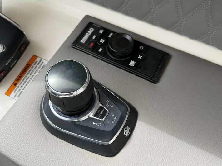  Yacht Photos Pics Control console of the 2024 Sea Ray SLX 310 Outboard.